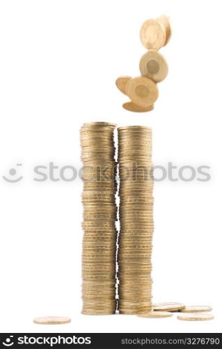 Isolated golden coin falling on stack
