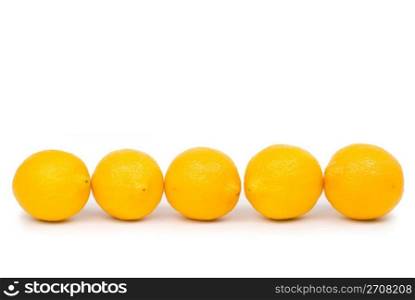 Isolated golden lemon in a row