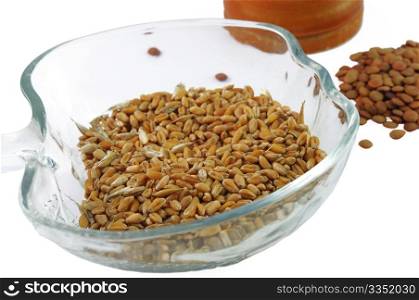 isolated grain in the glass bowl over white background