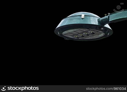 Isolated Green Street lamps on a black background with clipping path.