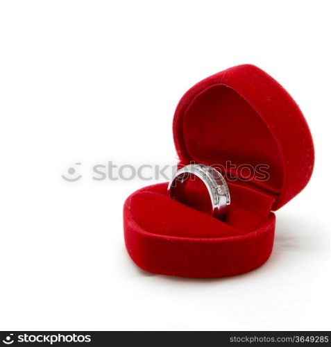 isolated male diamond ring in red valvet box