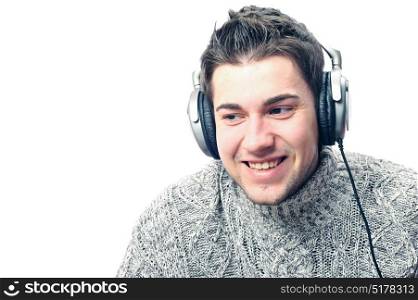 Isolated man on white background listening to the music with headphones