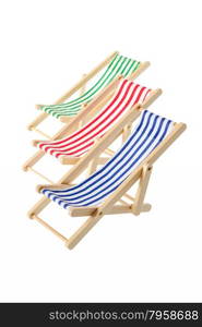 Isolated objects: group of wooden multicolored striped deck chairs, isolated on white background