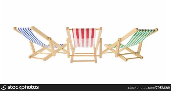 Isolated objects: group of wooden multicolored striped deck chairs, isolated on white background