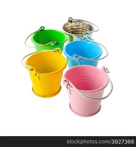 Isolated objects: perspective group of colorful buckets, isolated on white background
