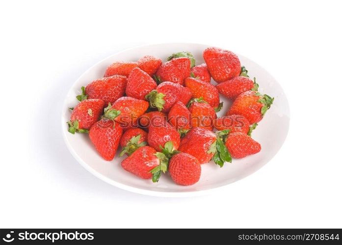 Isolated pile strawberry in white dish with white background