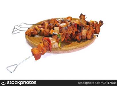 Isolated pork kebabs with a white background.