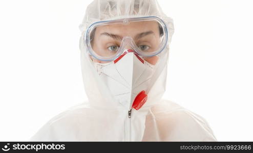 Isolated portrait of doctor wearing protective suit nd respirator mask over white background.. Isolated portrait of doctor wearing protective suit nd respirator mask over white background