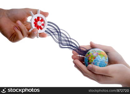 Isolated Ship steering wheel and globe in different hands