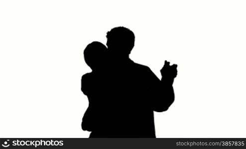 Isolated silhouette of a couple slow dancing