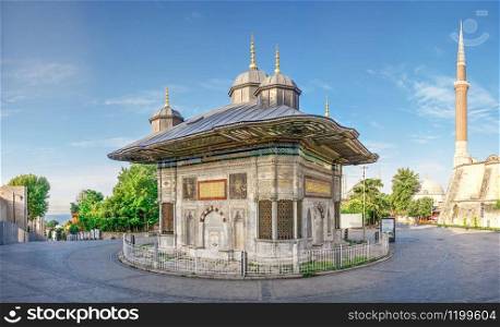 Istambul, Turkey ? 07.13.2019. Fountain of Sultan Ahmet behind the gates of Topkapi in Istanbul, Turkey, on a sunny summer day.. Fountain of Sultan Ahmet in Istanbul, Turkey