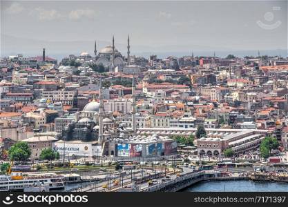 Istambul, Turkey ? 07.13.2019. Top view of Eminonu district of Istanbul and Galata bridge in Turkey on a summer day. Top view of Istanbul city and Galata bridge in Turkey