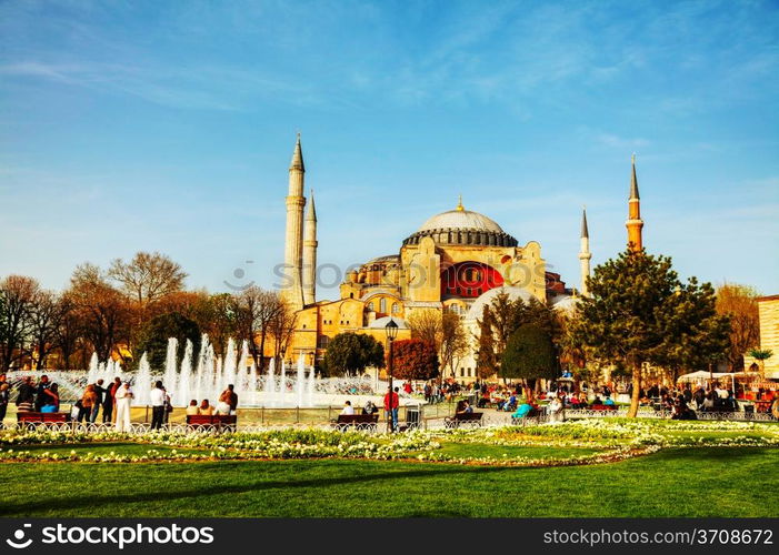 ISTANBUL - APRIL 5: Hagia Sophia with tourists on April 05, 2013 in Istanbul. Hagia Sophia is a former Orthodox patriarchal basilica (church), later a mosque, and now a museum.