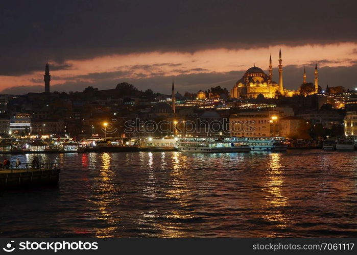 Istanbul at night, beautiful view of the sea, sky and city lights. Blue mosque in Istanbul - Turkey in a night