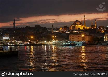 Istanbul at night, beautiful view of the sea, sky and city lights. Blue mosque in Istanbul - Turkey in a night
