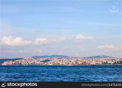 Istanbul city skyline, beginning of the Bosphorus Strait and an end of Marmara Sea, view on Uskudar district (Asian side) in Turkey, composition with copy space
