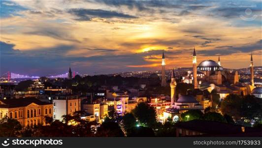 Istanbul sunset panorama with Bosphorus Bridge and Hagia Sophia Mosque, Turkey.
