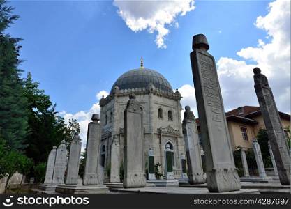 ISTANBUL, TURKEY - JUNE 22: Eyup Sultan historic tombstones in the cemetery of the image, 22 June 2014 in Istanbul Turkey. At the back there is the tomb of Sultan Mehmed Reshad.
