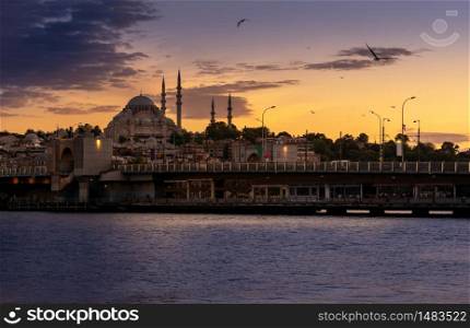 ISTANBUL, TURKEY - MAY 25, 2020: Suleymaniye mosque during sunset time. Red sky and clouds over Istanbul, Turkey. Silhouette of Suleymaniye Mosque.