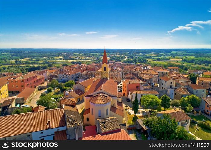 Istria. Town of Brtonigla on green istrian hill aerial view, Istria region of Croatia