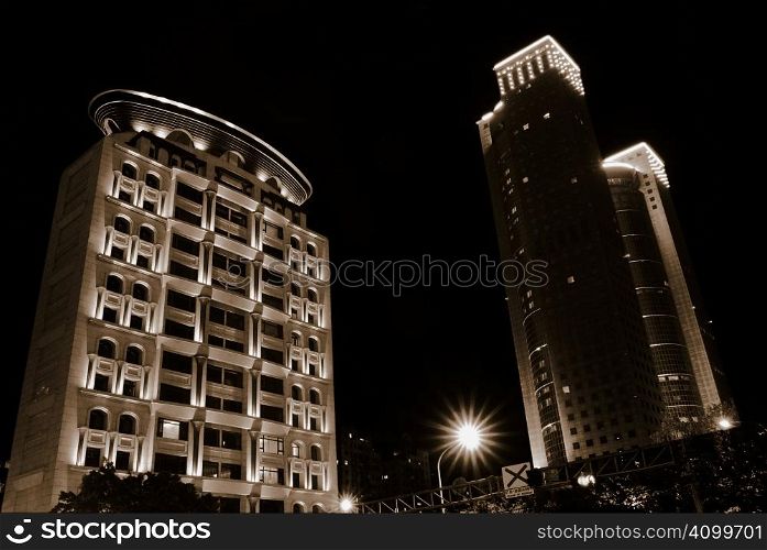 It is a beautiful apartment and skyscraper in the Taipei night scenes.
