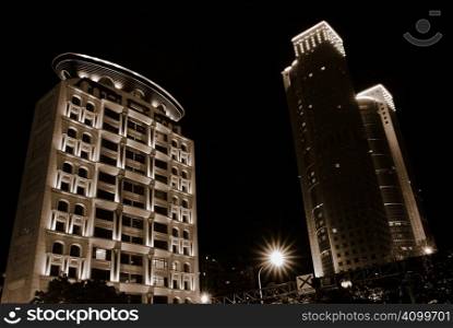 It is a beautiful apartment and skyscraper in the Taipei night scenes.