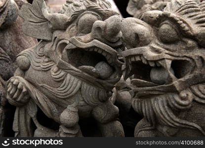 It is a traditional chinese carving of lion,just talk to each other.