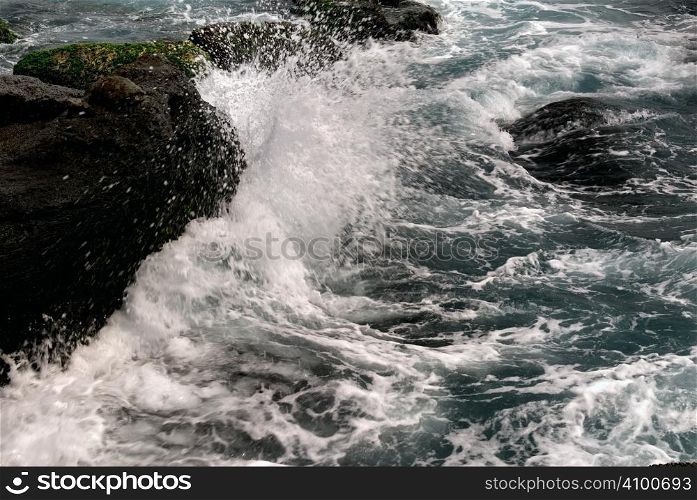It is powerful waves beating the rock.