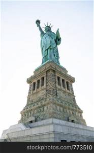 It's a cutout on white of lady liberty in the Statue of Liberty