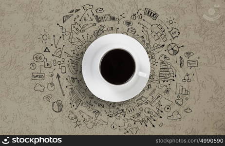 It&rsquo;s coffee time. Conceptual image of cup of coffee with business sketches at background