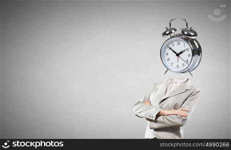It&rsquo;s high time. Businesswoman with alarm clock instead of her head