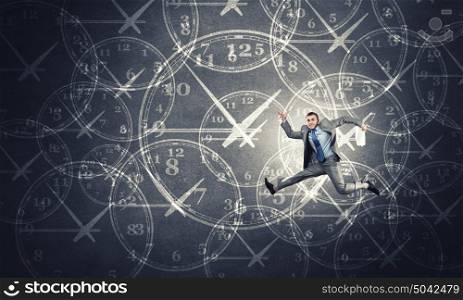 It&rsquo;s high time to do business. Concept of time with funny businessman running in a hurry