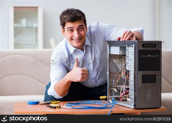 IT technician repairing broken pc desktop computer