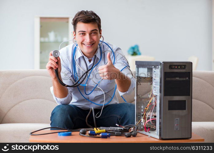 IT technician repairing broken pc desktop computer