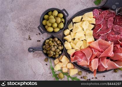 Italian antipasto meat platter - prosciutto ham, bresaola, salami and parmesan.. Italian antipasto meat platter - prosciutto ham, bresaola, salami and parmesan