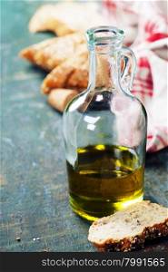 Italian Bread with Olive Oil for Dipping on wooden rustic table