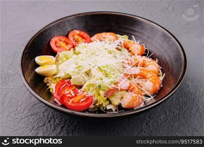 Italian Caesar salad with shrimp in bowl