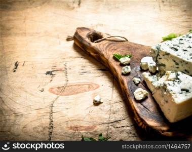 Italian cheese and herbs on the Board.. Italian cheese and herbs on Board.