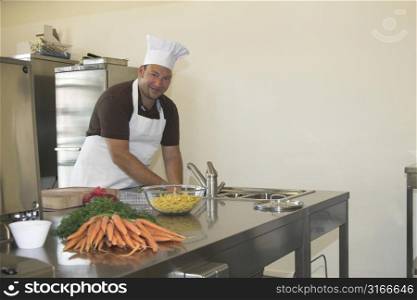 italian chef washing his hands prior to preparing the diner