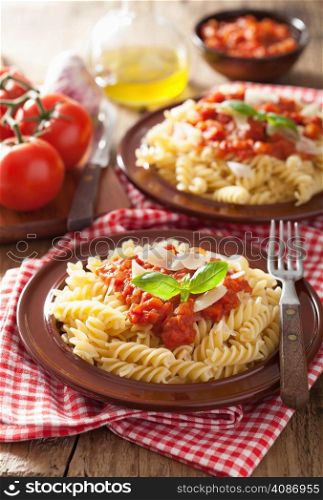 italian classic pasta fusilli with tomato sauce and basil