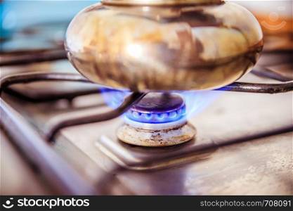 Italian coffee cooker on gas stove, breakfast