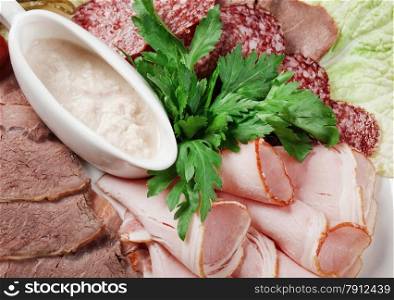 Italian cuisine.sliced food meat and sausage arrangement .