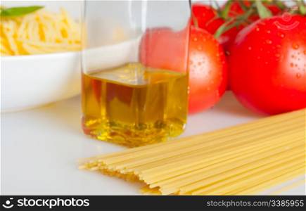 Italian Cuisine - Spaghetti, Fresh Tomatoes and Olive Oil - Shallow Depth of Field