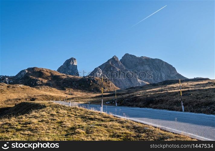 Italian Dolomites mountain peaceful sunny evening view from Giau Pass. Picturesque climate, environment and travel concept scene.
