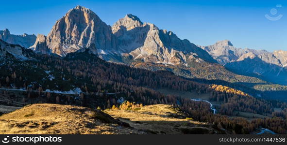 Italian Dolomites mountain peaceful sunny evening view from Giau Pass. Picturesque climate, environment and travel concept scene.