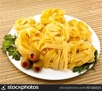 Italian fettuccine nest pasta on a plate