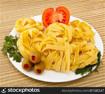 Italian fettuccine nest pasta on a plate