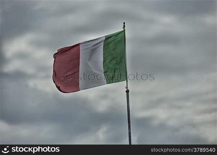 Italian flag blowing in the wind: red, white and green