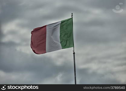 Italian flag blowing in the wind: red, white and green