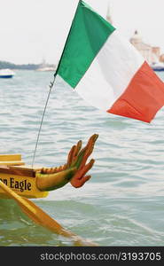 Italian flag on a boat, Venice, Veneto, Italy